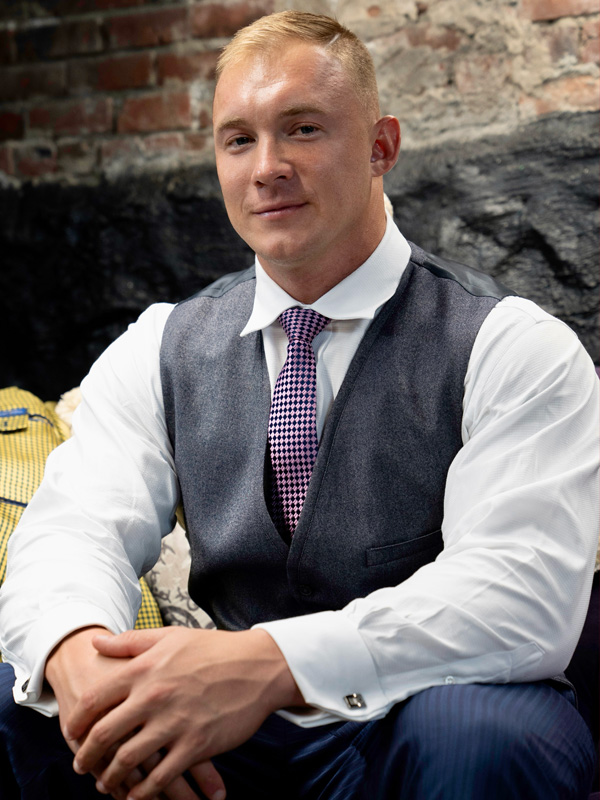 Taylor Black wearing a suit and tie